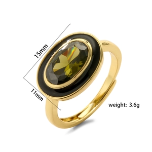 Detail showing 15mm oval olive green gemstone ring with black enamel and dimensions