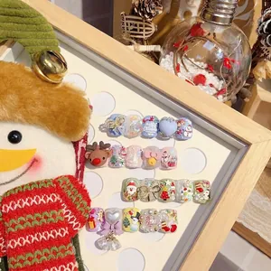 Exquisite 3D embossed Christmas nail stickers featuring reindeer, snowmen and festive patterns