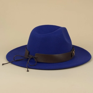 Detail of royal blue fedora hat with brown leather band and intricate rope knot texture