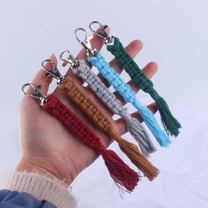 Handmade woven cotton tassel keychains in five colors with durable silver metal rings