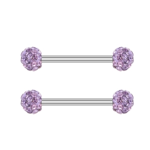 Macro view of silver stainless steel barbell body jewelry with lavender crystal balls