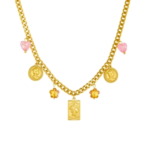 Gold vintage jewelry set with embossed portrait pendant and chain on white background