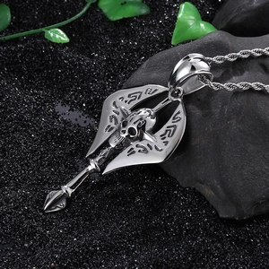 Punk style titanium steel skull and axe pendant with twist chain on a dark rocky background
