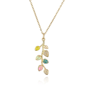Detailed close-up of leaf pendant necklace with colorful enamel and sparkling zircons