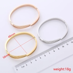 Detailed view of rhinestone triangle bracelet showing 48mm by 58mm inner diameter dimensions