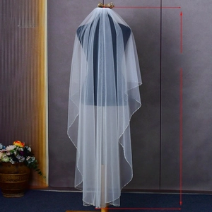 Wedding veil dimensions showing 150cm length and 160cm width on bridal mannequin