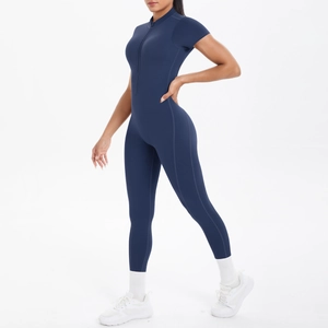 Close-up side view of navy blue short sleeve fitness jumpsuit with zipper collar