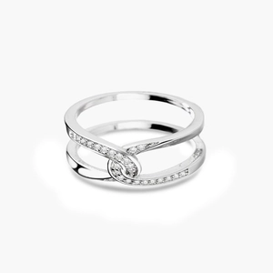 S925 sterling silver knot ring with sparkling zircon inlays on a white background