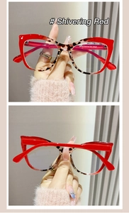 Makroansicht einer Cat-Eye-Brille mit Kontrast aus kräftigem Rot und Schildpatt