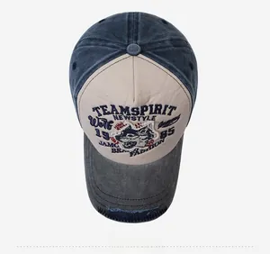 Top view of vintage washed baseball cap with Teamspirit embroidery and distressed details