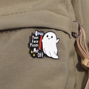 Ghost enamel pin with bloody axe on khaki canvas backpack for Halloween apparel