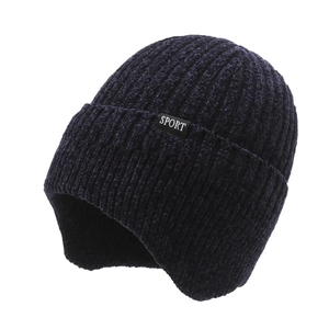 Navy blue winter knit beanie for men with ear protection and a sport logo label