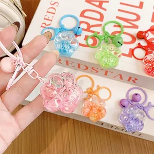 Cute cat paw liquid quicksand keychains in multiple vibrant colors for bags
