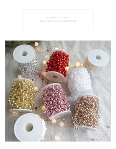Close-up of colorful pearl bead chains on rolls for Christmas and wedding festive decoration