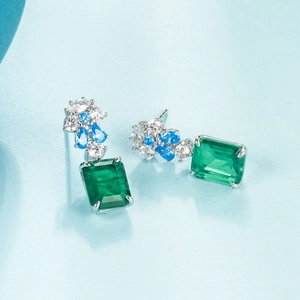 Elegant S925 silver drop earrings with emerald cut green stone and blue crystal accents
