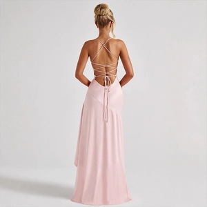 Elegant pink satin backless maxi dress with cross strap design and ruffled high slit