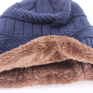 Winter knit beanie for men with thick thermal fleece lining in navy blue and brown