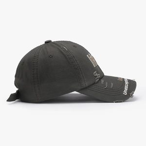 Distressed charcoal cotton baseball cap with Unexceptional embroidery and vintage torn details