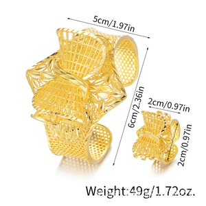 Detailed view of hollow gold cuff bracelet and ring set with size and weight specs