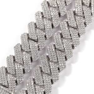 Macro shot of 20mm silver Cuban chain with shimmering handset cubic zirconia stones