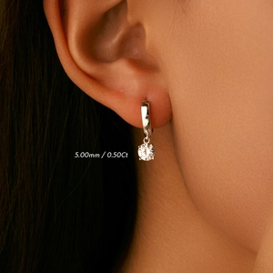 Elegant S925 sterling silver drop earring with 0.5ct moissanite on model ear