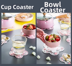 Detail of pink and white cherry blossom silicone heat insulation mats for cups and bowls
