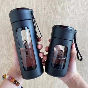 Portable matte black tea infuser glass bottle set with silicone handle and clear window