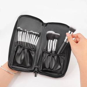 Trousse de maquillage portable en cuir PU noir avec 15 pinceaux professionnels bicolores