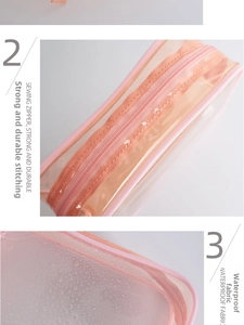 Close-up of waterproof PVC fabric with water droplets and durable pink sewing zipper