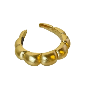 Metallic gold cloud padded headband with puffy croissant design for women