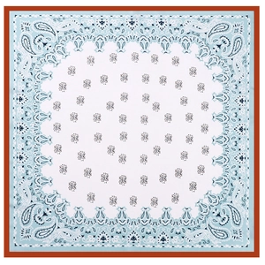 Close-up of square satin scarf featuring blue paisley patterns with a reddish-brown border
