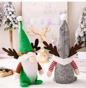 Detail of Christmas gnomes featuring green felt reindeer antlers and striped arms decor