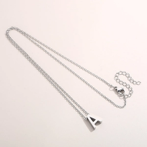 Detail of silver letter A pendant necklace with lobster clasp and extender chain