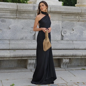 Detail of the backless halter design on this elegant slim black silk evening maxi dress