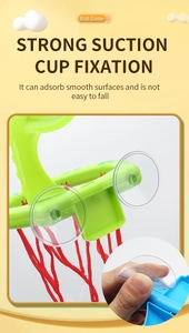 Detail showing two large transparent suction cups on the back of the dinosaur basketball hoop