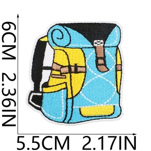 Detailed embroidery patch of a blue and yellow backpack showing 6x5.5cm size dimensions