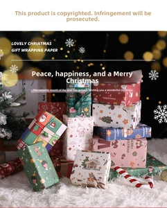 Detail of Christmas wrapping paper featuring Santa, snowman, and reindeer festive patterns