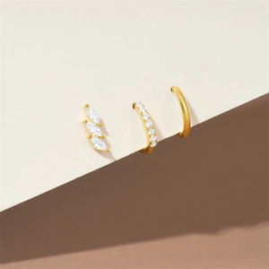 Detailed set of three gold S925 silver earrings featuring marquise and pavé zircon stones