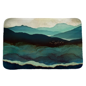 Absorbent flannel floor mat with abstract blue mountain landscape and anti-slip backing