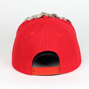 Detail of red hip hop baseball cap back with silver metallic studs and snapback closure