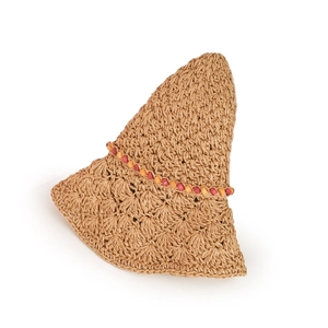 Detail of hand-woven straw beach hat featuring colorful beaded trim and scalloped brim