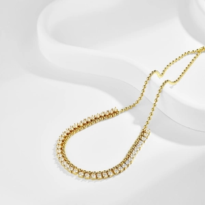 Detail of S925 silver necklace with olive leaf pendant and sparkling zircon stones