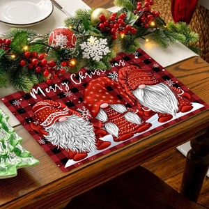 Christmas table mat with red plaid pattern, gnome graphics and Merry Christmas text