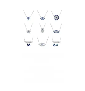 Macro display of S925 silver Evil Eye and Hamsa Hand pendant necklaces with blue zircon