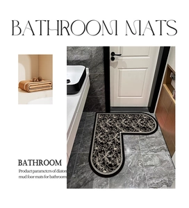 L-shaped black diatom mud bathroom mat featuring golden floral patterns and pearl edge detail