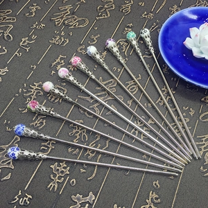 Detailed set of ten silver metal hairpins with assorted colorful ceramic bead tops