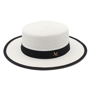 French style white boater straw hat with black ribbon trim and gold M metal buckle