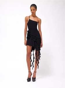 Detail of black one-shoulder mini dress with 3D floral ruffles and asymmetric fringe