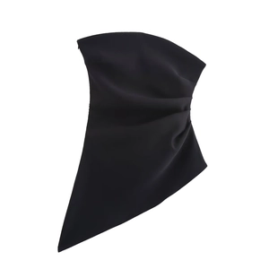 Detail view of black asymmetric tube top featuring elegant side draping and ruched pleats