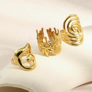 Minimalist 18K gold plated flower and wave rings with starfish and spiral designs